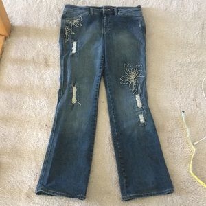 Embroidered flower distressed jeans